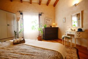 En eller flere senge i et værelse på Villa Olimpia + 55 billeder