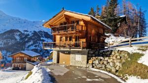 a log cabin in the mountains in the snow at Chalet La Giete 6 personnes La Forclaz in Haudères