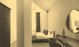 Ένα ή περισσότερα κρεβάτια σε δωμάτιο στο 2 izvrsne sobe