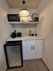 Kuchyň nebo kuchyňský kout v ubytování צימרים סוף העולם 3