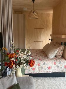 Postel nebo postele na pokoji v ubytování De Eikenloft