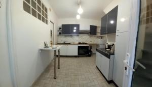 Køkken eller tekøkken på Résidence Scarlette