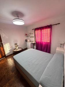 Ένα ή περισσότερα κρεβάτια σε δωμάτιο στο Apartamento 1