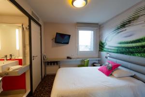 Giường trong phòng chung tại ibis Styles Saint Brieuc Gare Centre +48 ảnh