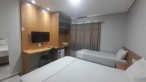 TV a/nebo společenská místnost v ubytování Hotel Bonina