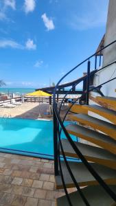 Bazén v ubytování Mirassol Flats nebo v jeho okolí