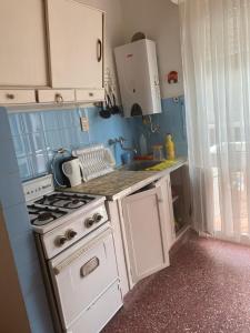 Køkken eller tekøkken på Depto Santa Teresita Juanita