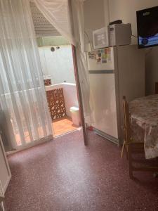 Køkken eller tekøkken på Depto Santa Teresita Juanita