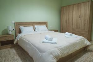 Postel nebo postele na pokoji v ubytování HomeSweetHome