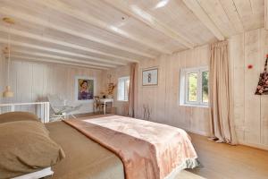 Postel nebo postele na pokoji v ubytování Apple Tree House