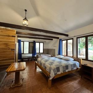 Postel nebo postele na pokoji v ubytování Vista Encantada Hotel