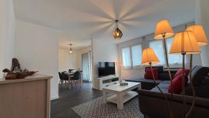 Et tv og/eller underholdning på Bel appartement ski les 3 vallées et Thermalisme