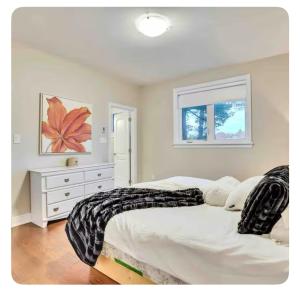 Ένα ή περισσότερα κρεβάτια σε δωμάτιο στο Riverside Dreams