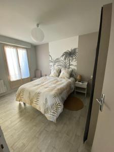 Ένα ή περισσότερα κρεβάτια σε δωμάτιο στο Appartement lumineux centre-ville