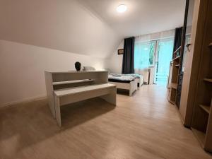 Ένα ή περισσότερα κρεβάτια σε δωμάτιο στο Apartment Am Hang II Natur & Ruhe