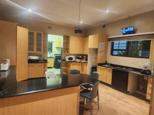 Køkken eller tekøkken på Home Care Guest House