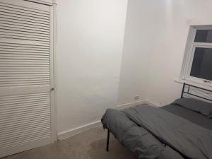 En eller flere senge i et værelse på hougton