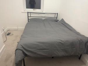 En eller flere senge i et værelse på hougton