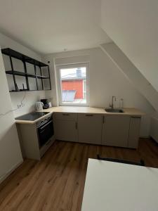 Kuchyň nebo kuchyňský kout v ubytování Monteurswohnung Mesum + 7 fotografií