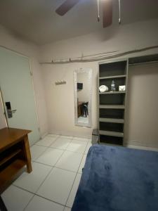 a bedroom with a bed and a mirror in it at Habitacion C10 privada centro monterrey in Monterrey