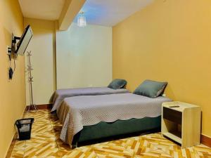 Ένα ή περισσότερα κρεβάτια σε δωμάτιο στο Los Alamos +13 φωτογραφίες