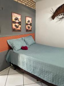 Postel nebo postele na pokoji v ubytování Chalé borboleta