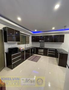 Køkken eller tekøkken på Bang For Your Buck