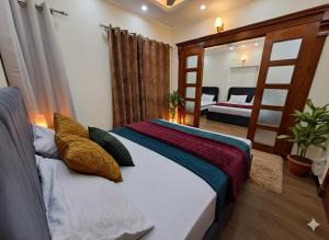 Postel nebo postele na pokoji v ubytování Regal Horizon G-13 + 10 fotografií