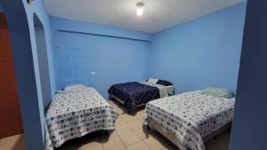 Postel nebo postele na pokoji v ubytování Casa Maya Vibes