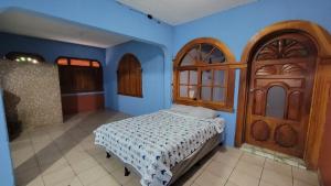 Postel nebo postele na pokoji v ubytování Casa Maya Vibes