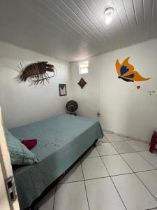 Postel nebo postele na pokoji v ubytování Chalé borboleta