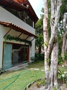 Κήπος έξω από το Casa Arraial Ajuda Jardim da Mata