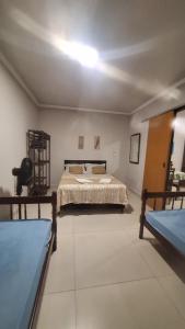 Giường trong phòng chung tại Hospedagem do BIRÓ +32 ảnh