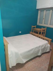 Ένα ή περισσότερα κρεβάτια σε δωμάτιο στο La Huella