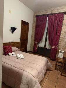 Кровать или кровати в номере Crismar Hotel Rural Arribes del Duero