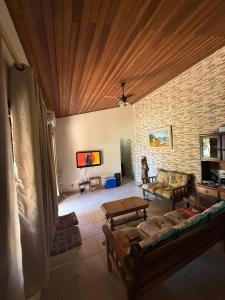 Billede fra billedgalleriet på Casa com Espaço Gourmet e Piscina a 2min da Praia i Caraguatatuba