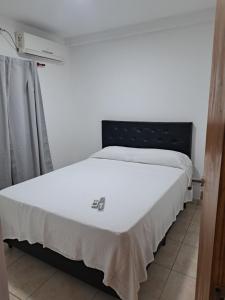 Ένα ή περισσότερα κρεβάτια σε δωμάτιο στο Apart VENECIA