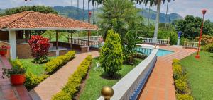 Πισίνα στο ή κοντά στο Finca Piscina Playita Kiosco Bar Combia - Estación Pereira