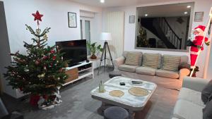 Posezení v ubytování Au refuge du Bonheur