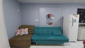 Χώρος καθιστικού στο Casa com ar condicionado