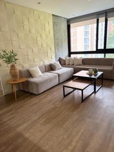 Et opholdsområde på NOK Beautiful 2BR Apartment in El Poblado + 26 billeder