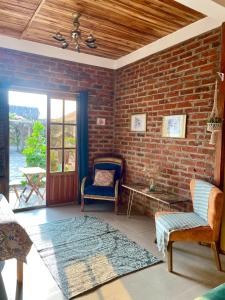 Posezení v ubytování Nativo Lodge Cabaña