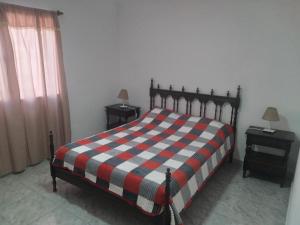 Ένα ή περισσότερα κρεβάτια σε δωμάτιο στο Saavedra 2