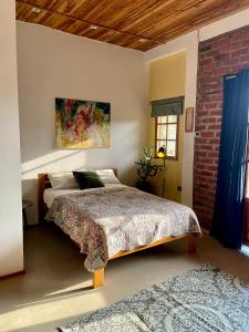 Postel nebo postele na pokoji v ubytování Nativo Lodge Cabaña