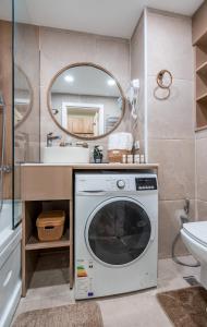 Ένα μπάνιο στο F2 NEW GUDAURI MOUNTAIN VIEW APARTMENTs