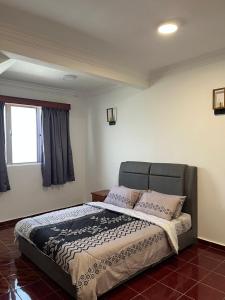 Postel nebo postele na pokoji v ubytování Glory Beach Resort Private Penthouse Apartment