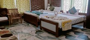 Ένα ή περισσότερα κρεβάτια σε δωμάτιο στο Five Falls RAMANA VILLA