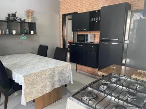 Kuchyň nebo kuchyňský kout v ubytování Sagui House somente para mulheres + 2 fotografie