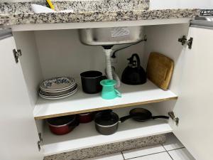 Η κουζίνα ή μικρή κουζίνα στο Residencial Nova Vista