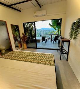 Ένα ή περισσότερα κρεβάτια σε δωμάτιο στο Cabañas Flor Del Monte